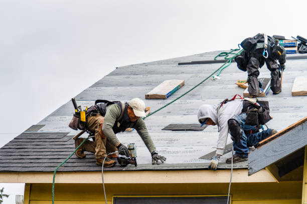 Professional Gutter Installation technician working in Summit, WA